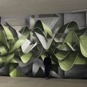 Dado ribbons wildstyle at Minarelli's Garage in Cortina D'Ampezzo, front view with the artist posing in the middle
