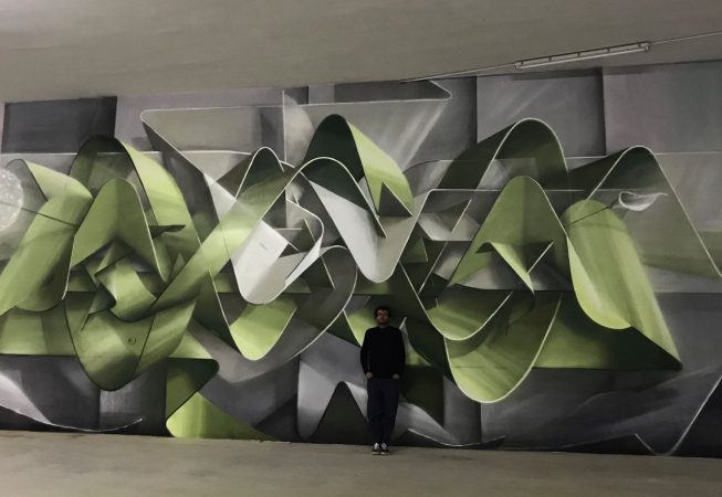 Dado ribbons wildstyle at Minarelli's Garage in Cortina D'Ampezzo, front view with the artist posing in the middle