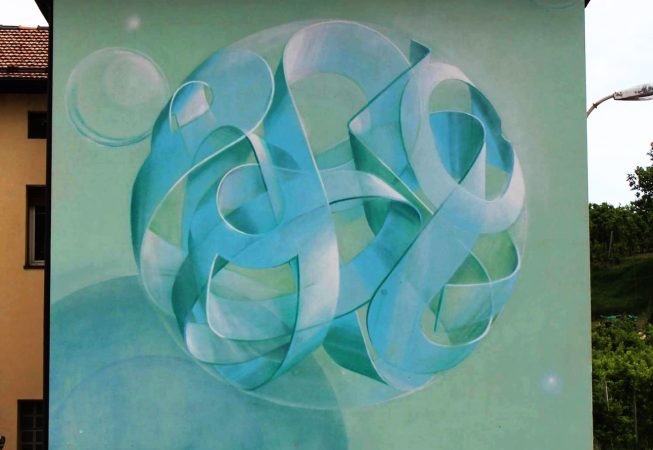 Sfera fiocco di neve by Dado artwork on wall in Cles - aerosol art - front view