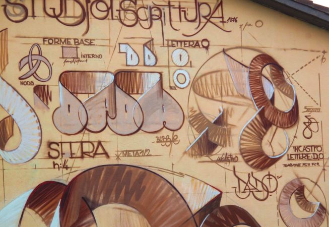 Details of a mural painting depicting the graphic studies for the letters forming the tag Dado in a graffiti spherical wildstyle piece.