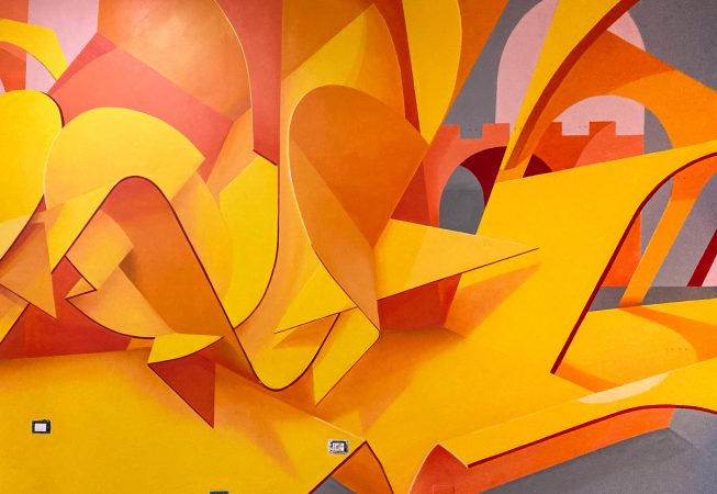 Detail of an interior wall decoration representing an abstraction of Bologna's arcs, Portici in yellow-orange tones. Artwork by Dado.