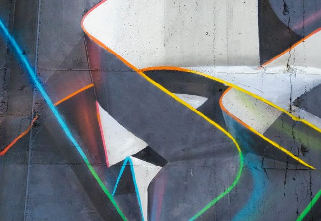 Mural painting representing weaving stiff ribbons forming the name of the artist Dado, in dark grays and white tones with sharp cutting multi color outline. Detail
