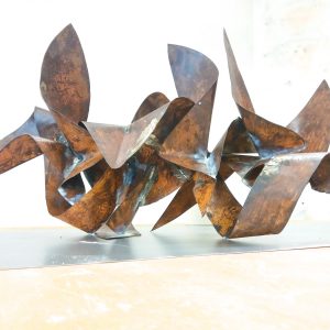 Sculpture made of bent and torched copper ribbons in original copper color with some oxidation stains and welding marks. Artwork by Dado