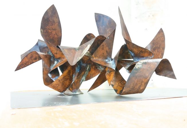 Sculpture made of bent and torched copper ribbons in original copper color with some oxidation stains and welding marks. Artwork by Dado