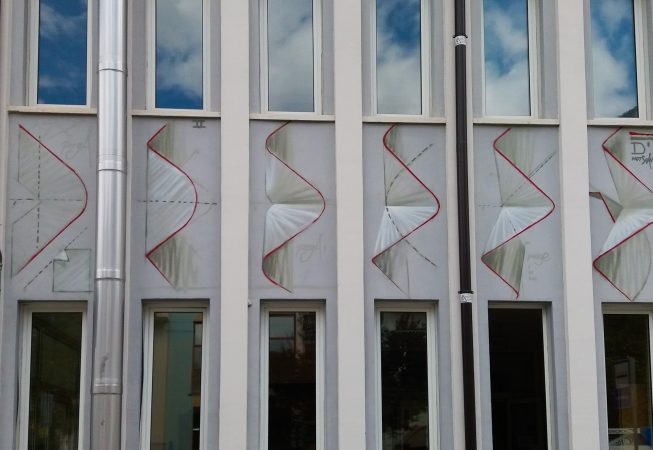 Partial detail of a mural painting depicting the graphic studies for any single letter and other shapes used in a graffiti wildstyle piece to compose the name Dado, ground view