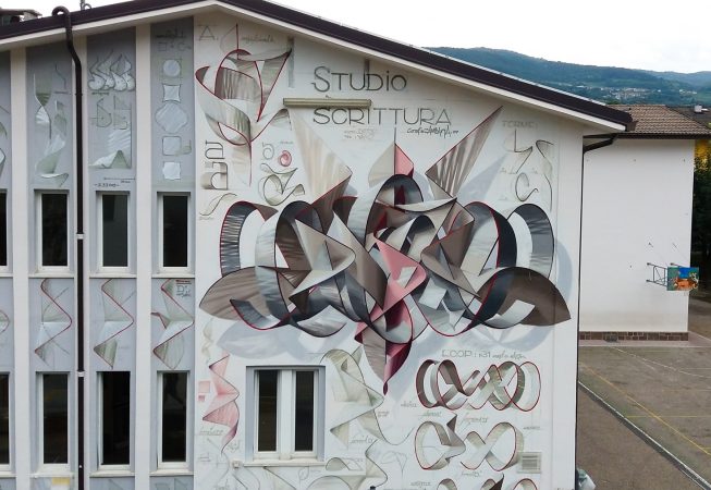 Partial detail of a mural painting depicting the graphic studies for any single letter forming the name Dado in a graffiti wildstyle piece, front aereal view