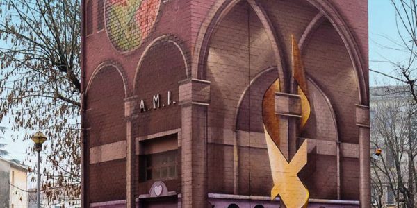 A Church interiors detailed mural graffiti, painted on all four sides of an electric cabin small building, gives the illusion of a realistic interiors accessible space, front lateral view. Artwork by Dado